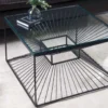 Abstrakter Couchtisch ILLUSION 60cm schwarz Metall Glas handmade modernes Design