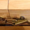 Ausziehbarer Esstisch MOSAIK 140-180cm braun Pinie recyceltes Massivholz Metall schwarz