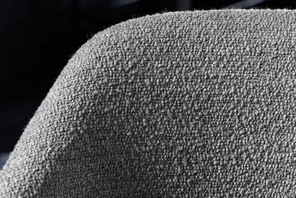 Design Stuhl VOGUE grau Bouclé schwarze Metallbeine