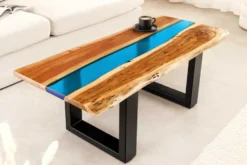 Massiver Couchtisch LIQUID 110cm braun Akazienholz Baumkante schwarz Eisen blau