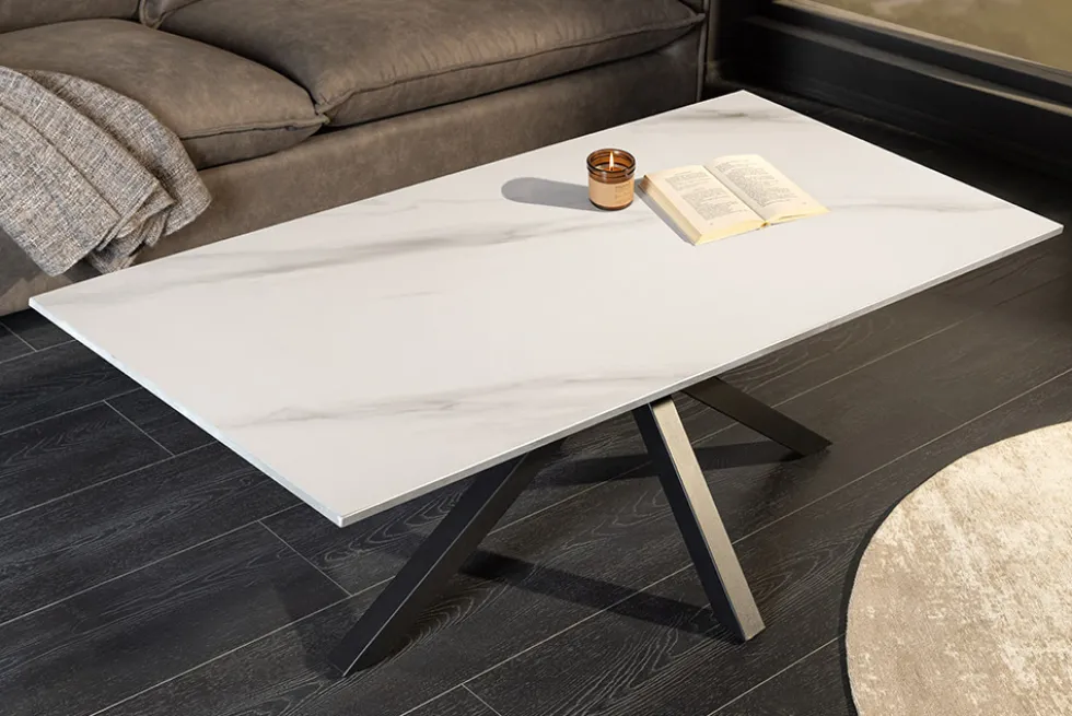 Moderner Couchtisch GALAXIE 100cm weiß Keramik schwarz Metall Sterngestell